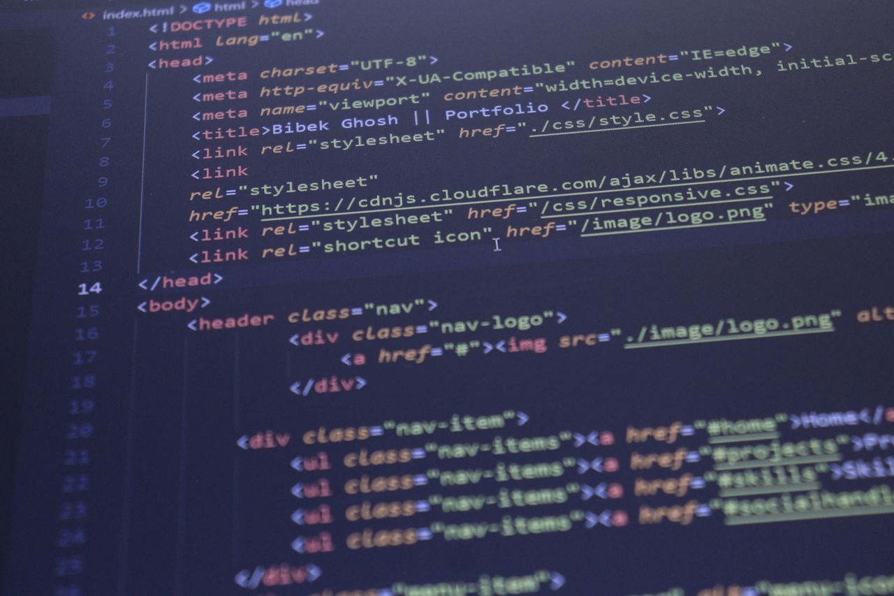 why-choose-us Close-up view of HTML and CSS code displayed on a computer screen, ideal for programming and technology themes.