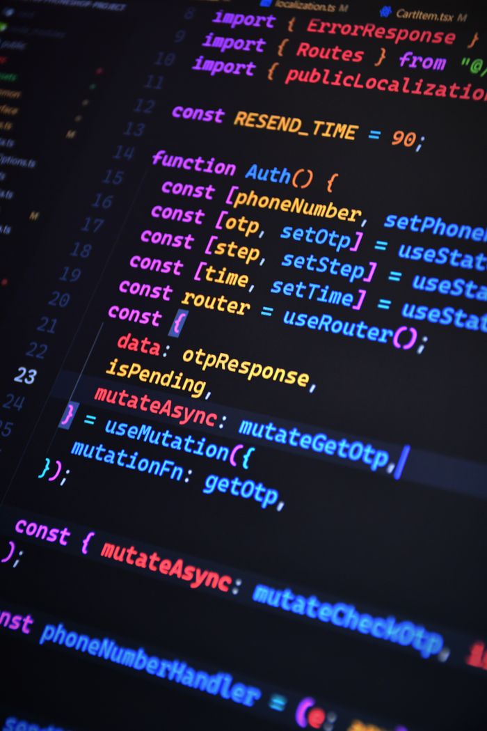 gallery-3 Close-up of vibrant JavaScript code for web development with ReactJS and Tailwind CSS.