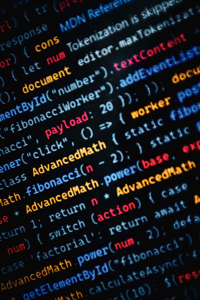 gallery-2 Close-up of vibrant JavaScript code displayed on a monitor showcasing web development.